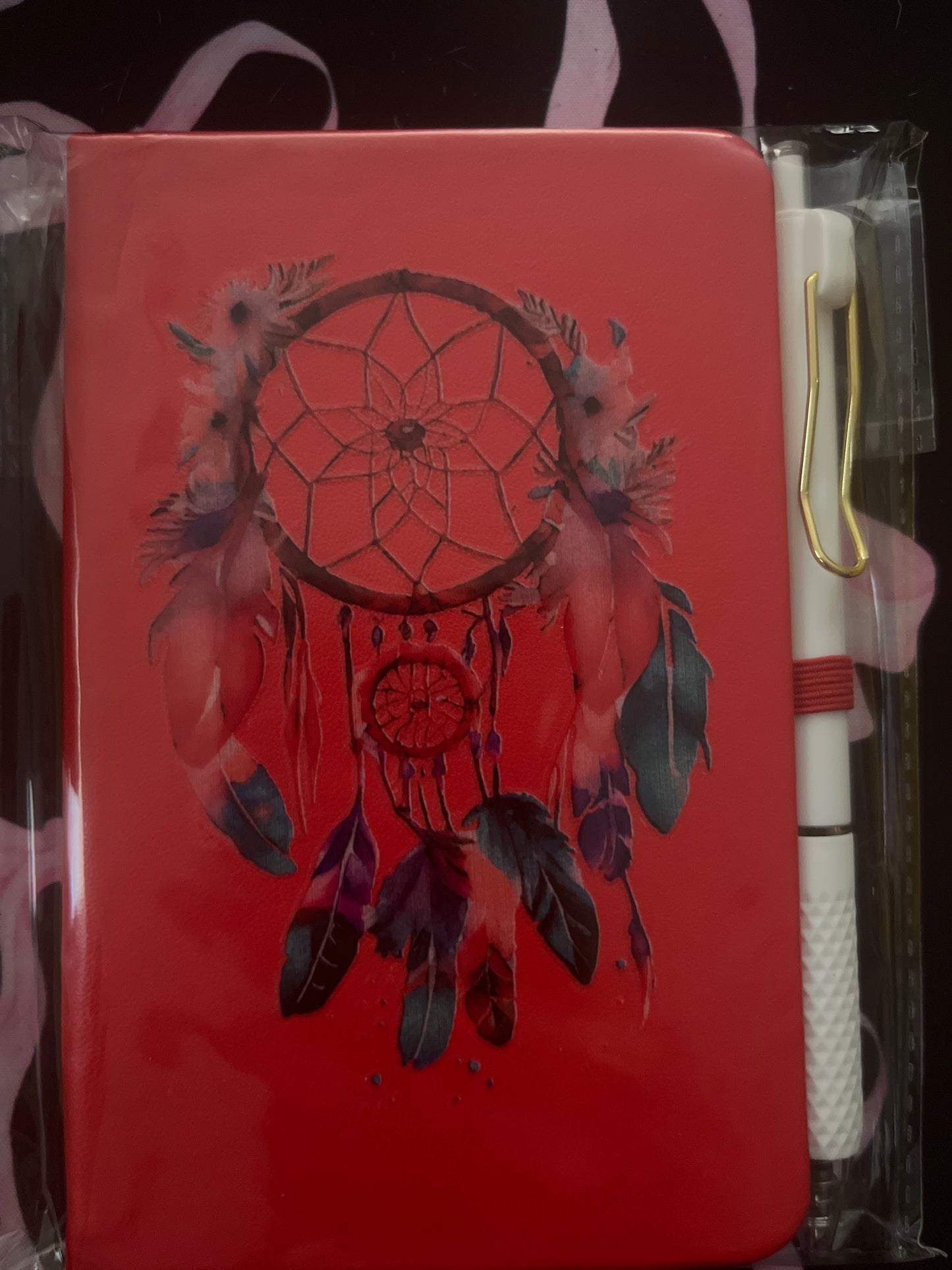 Pocket notebook with pen