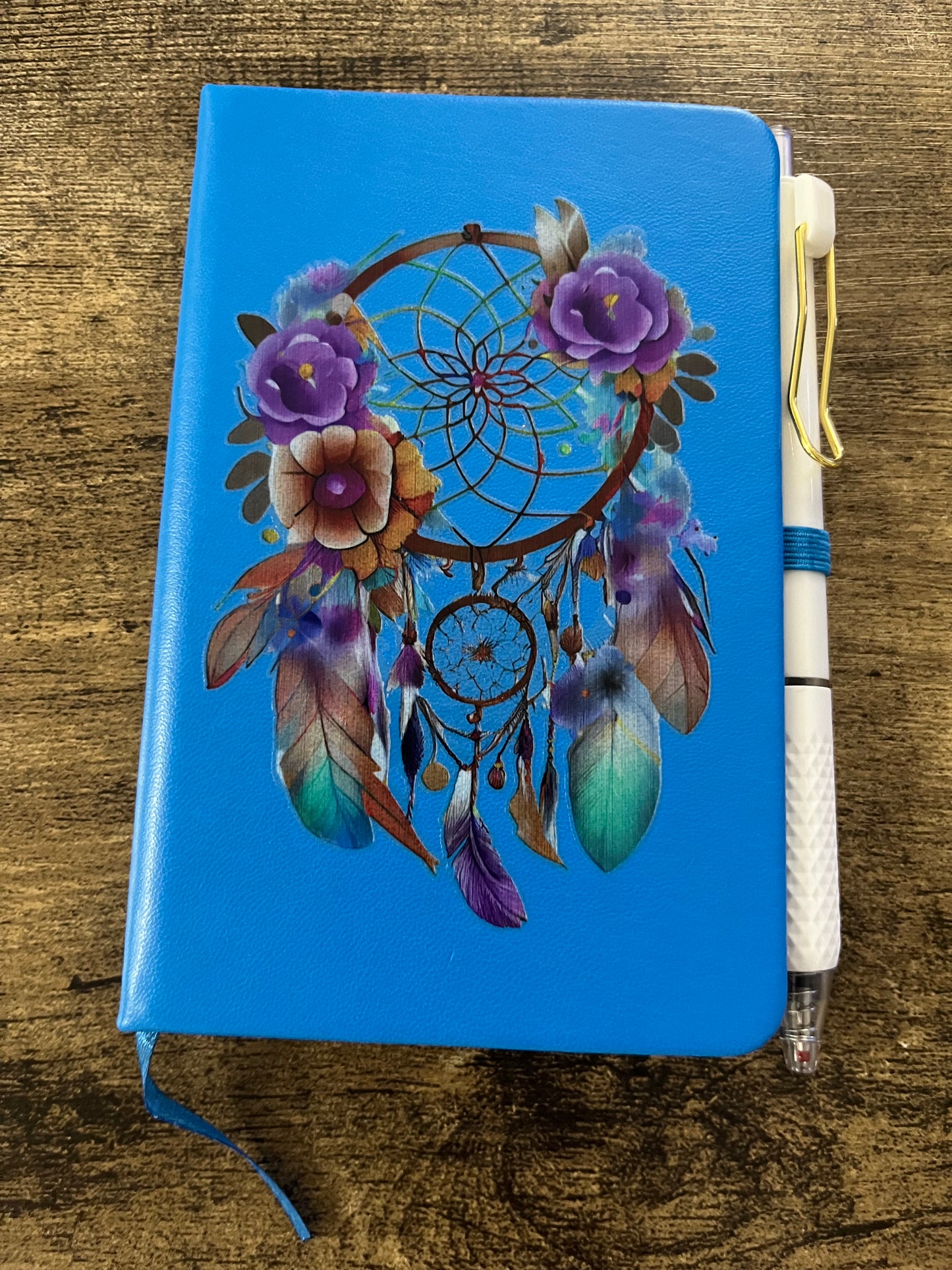 Pocket notebook with pen