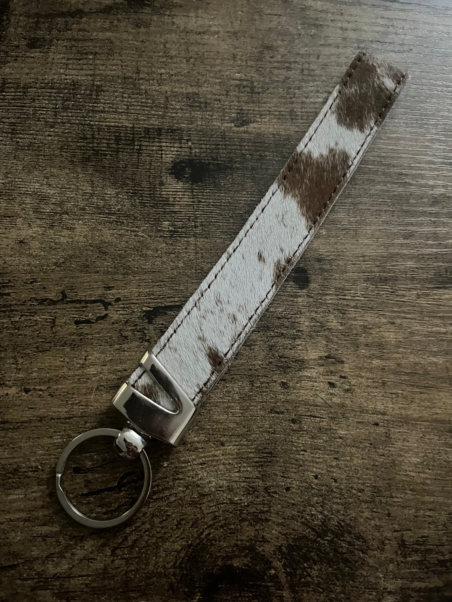 Cow hide wristlet strap